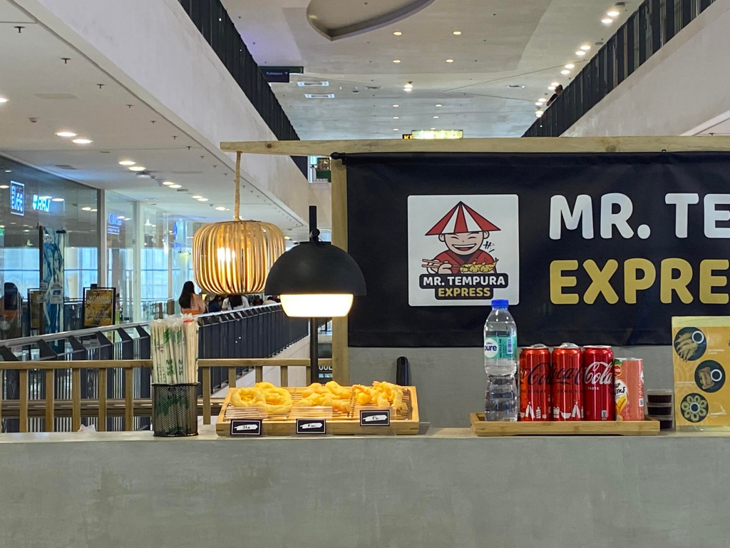 Mr. Tempura Express at Centrio Mall features a modern and stylish food stall design. The image showcases the food display, branding, and a clean, inviting atmosphere.