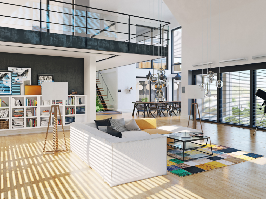 This modern open-plan living area features a white sectional sofa, a large bookcase, and a glass coffee table. The design emphasizes clean lines, natural light, and a sophisticated color palette, creating a timeless and elegant living space.