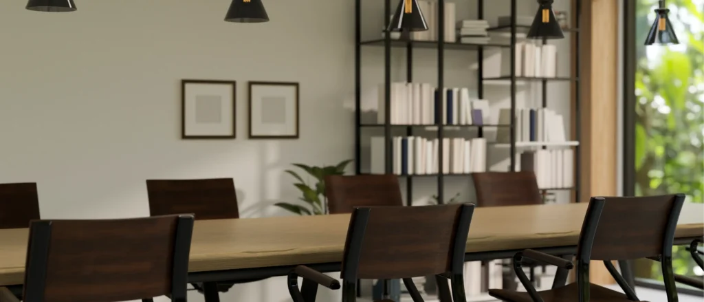 A modern conference room featuring a long table and chairs, showcasing stylish and functional furniture suitable for a professional setting.